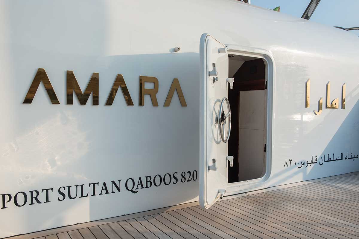The name AMARA on the hull, in English and Arabic