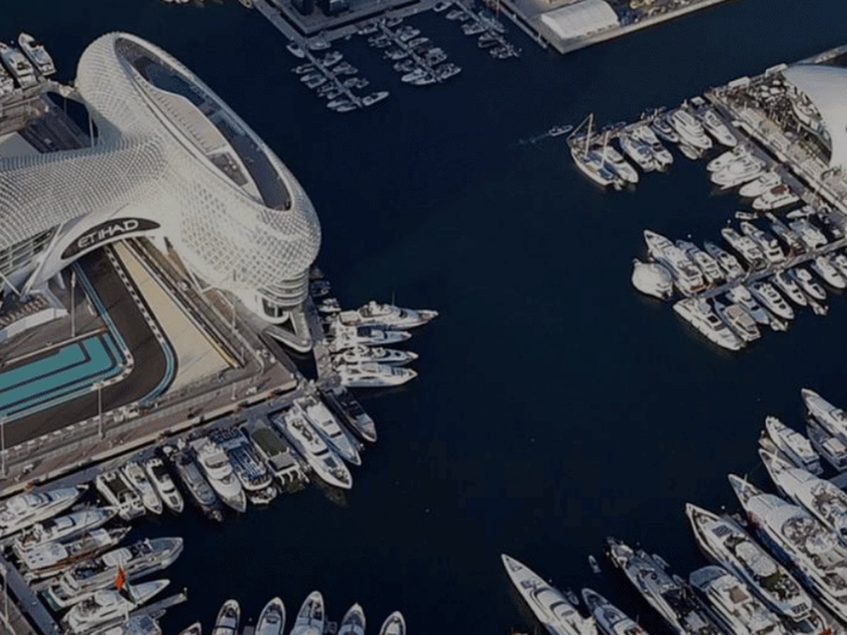 Yas Marina Circuit from the air, superyachts moored along the track