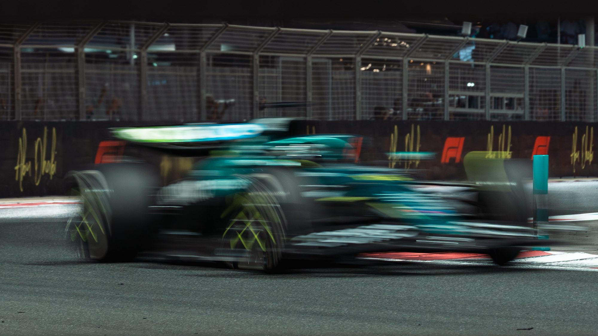 Aston Martin in motion blur on the circuit