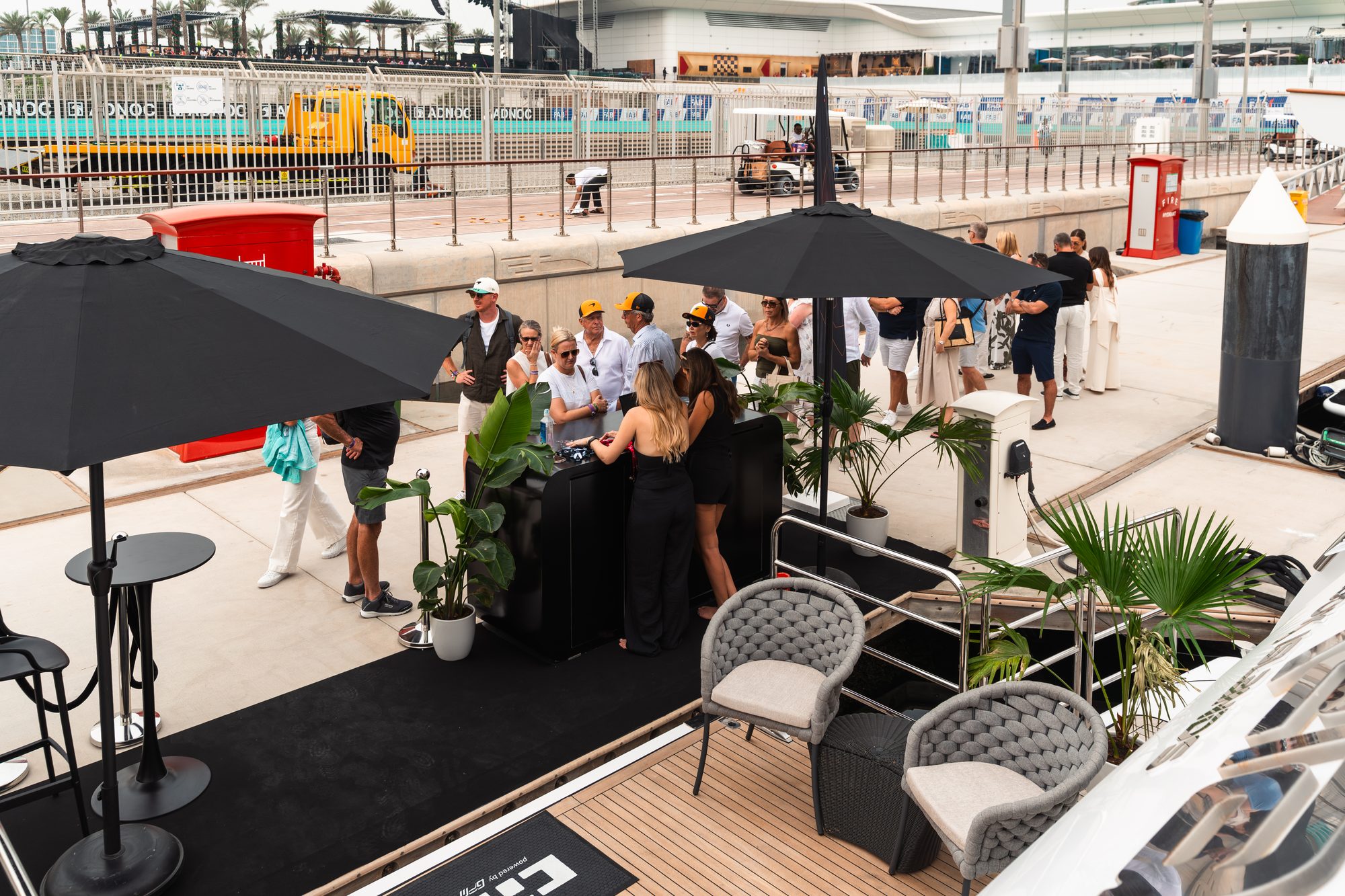 Deck bar and lounge set up on the quay