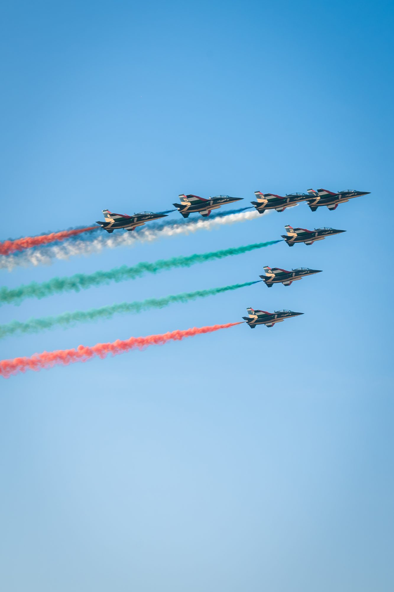 Frecce Tricolori trailing green, white and red smoke