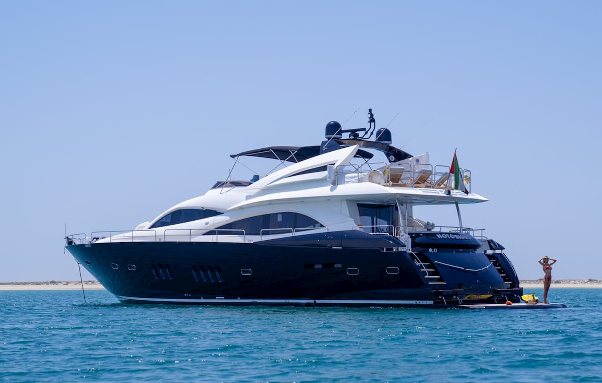 Gold's Yacht on Dubai waters at sunset
